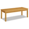 Scratch- and stain-resistant occasional table with veneer top and solid wood legs.