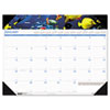 Desk pad calendar with a different photographic image each month.
