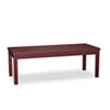 Scratch- and stain-resistant occasional table with veneer top and solid wood legs.