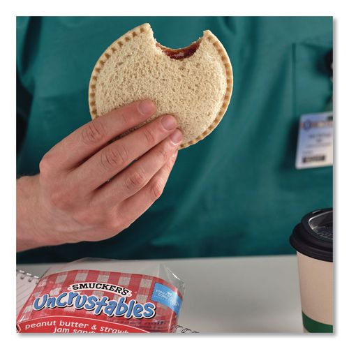 Picture of UNCRUSTABLES Peanut Butter and Strawberry Jam on Wheat Bread, 2.6 oz Bag, 48/Carton